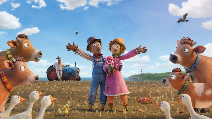 A farmer and woman celebrate on a farm surrounded by cows and geese under a bright sky.